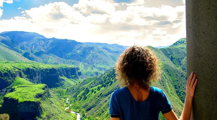 Photo of the Young woman looking at amazing view